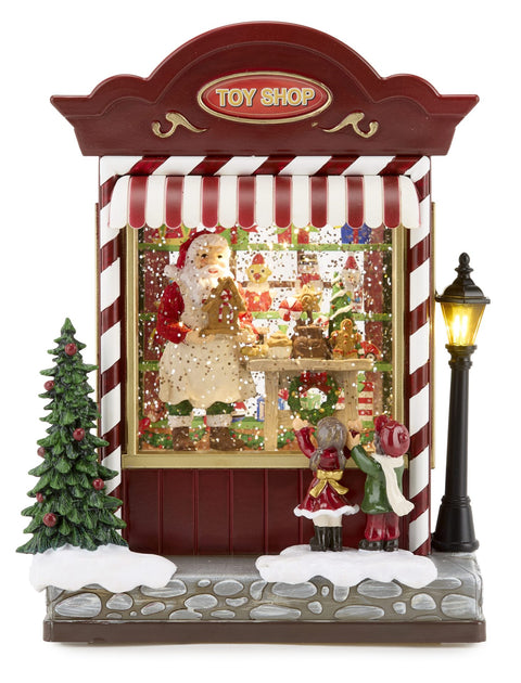FADE GLOBO DI NEVE SNOWGLOBE TOYSHOP 17X13X23 CON LUCI E MUSICA
